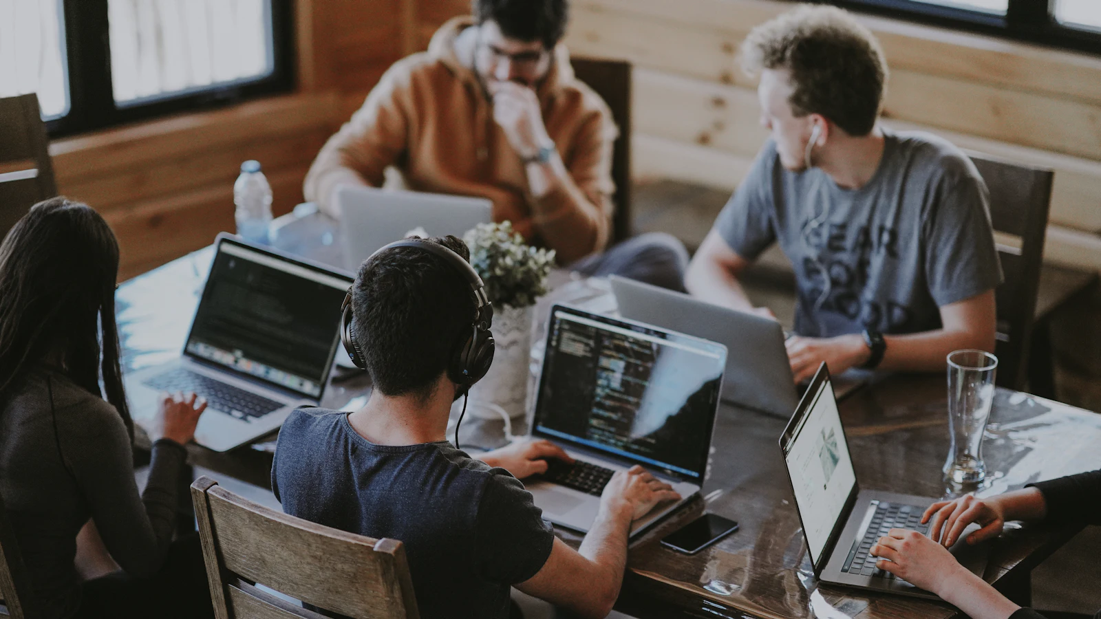 Developers planning a software sprint together at a table