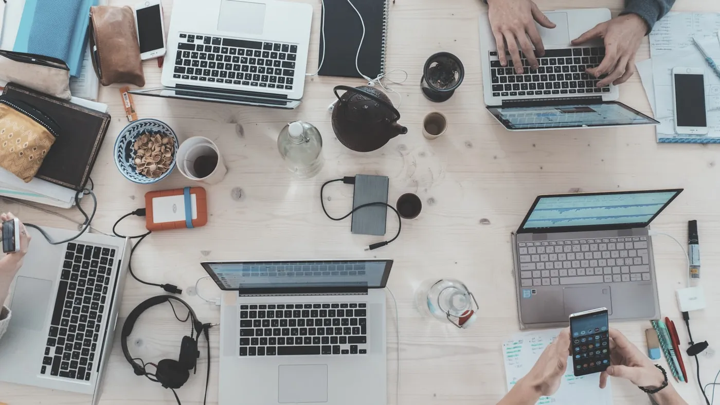 Team collaborating on long term content marketing for a service brand